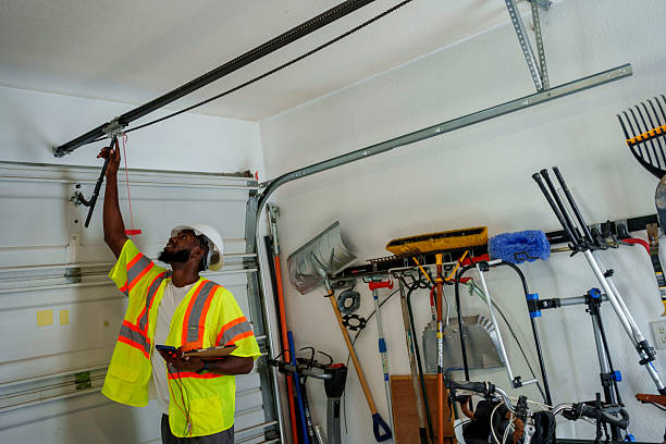 Professional Garage Door Panel Replacement technician working in Stiles, PA